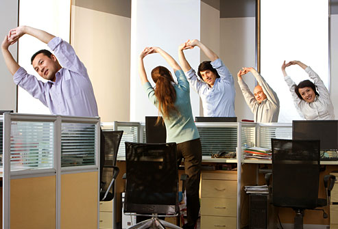 getty_rf_photo_of_office_workers_stretching